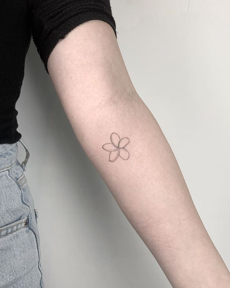 Tiny Flower Tattoo